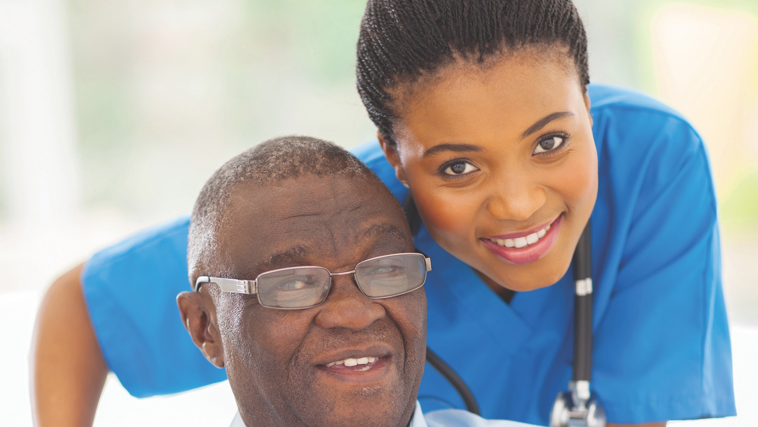 A home health care aide with an older adult