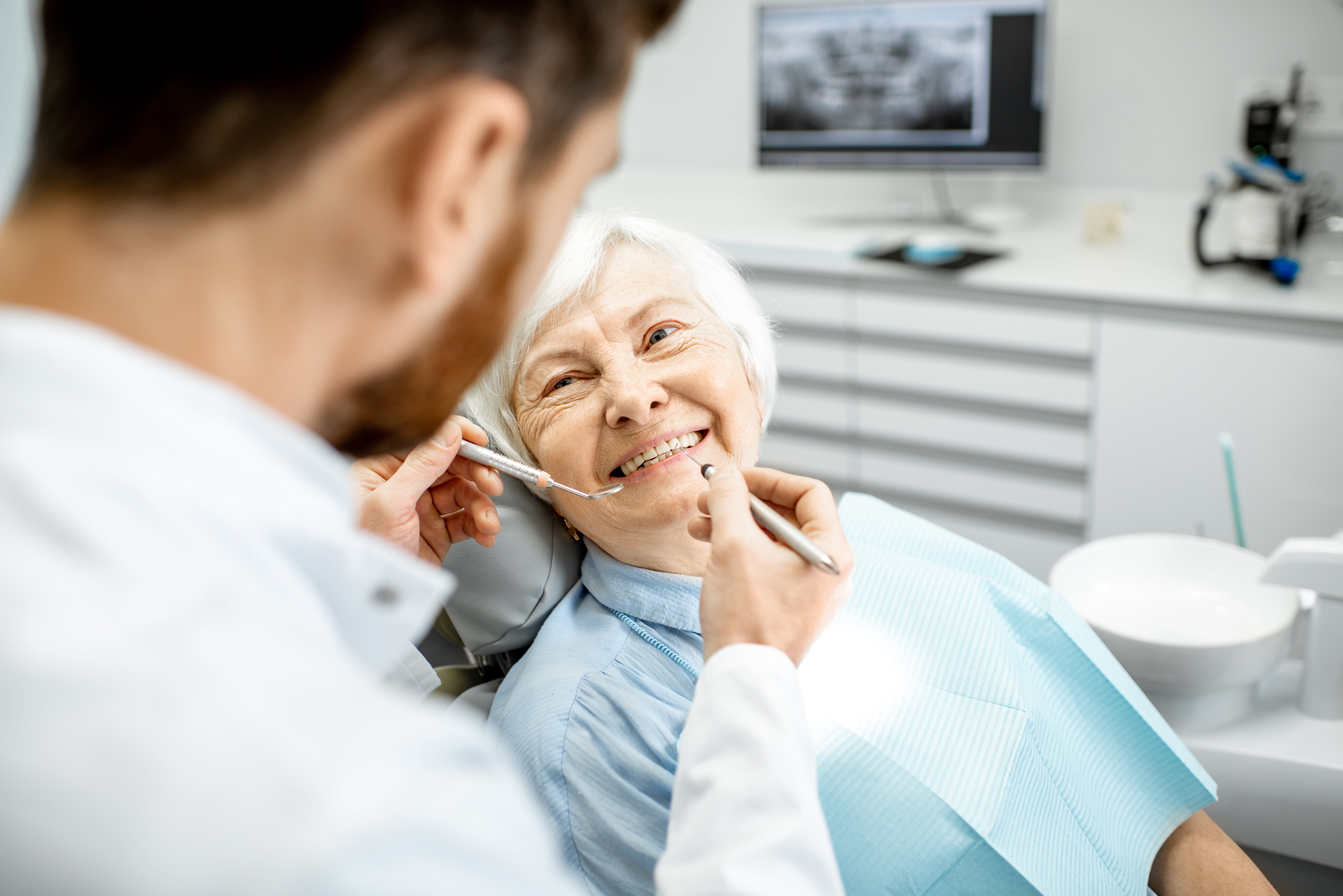An older adult attending a dental appointment