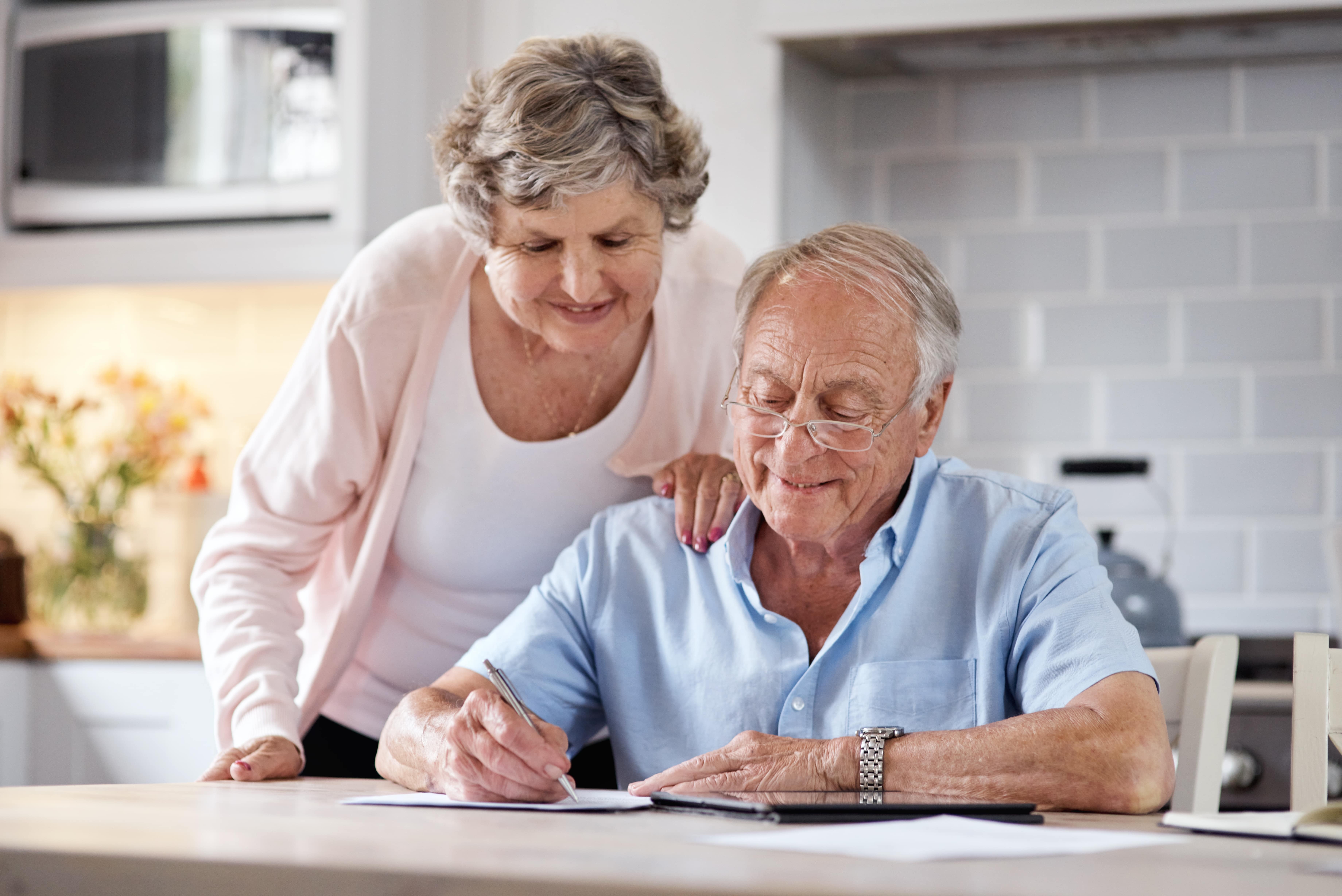 An older couple reviewing their legal documents