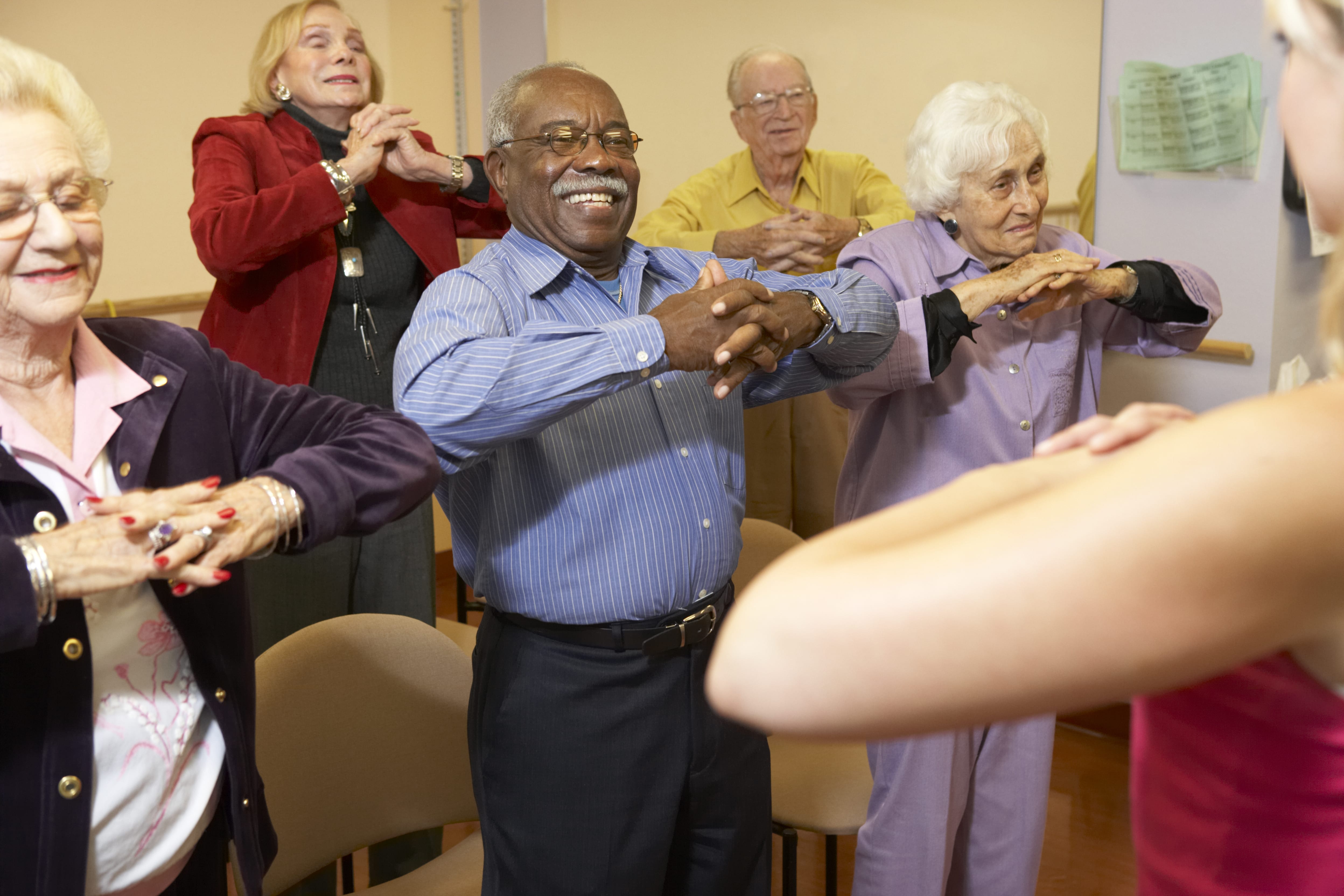 Senior center attendees participating in an exercise program